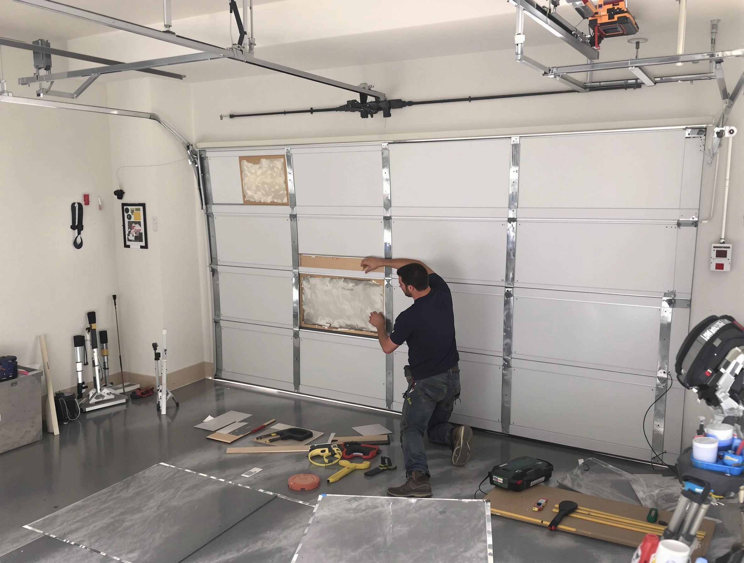 Garage Door Panel Repair in Roy